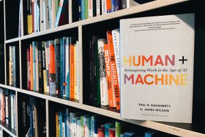 human + machine reimagining work in the age of ai